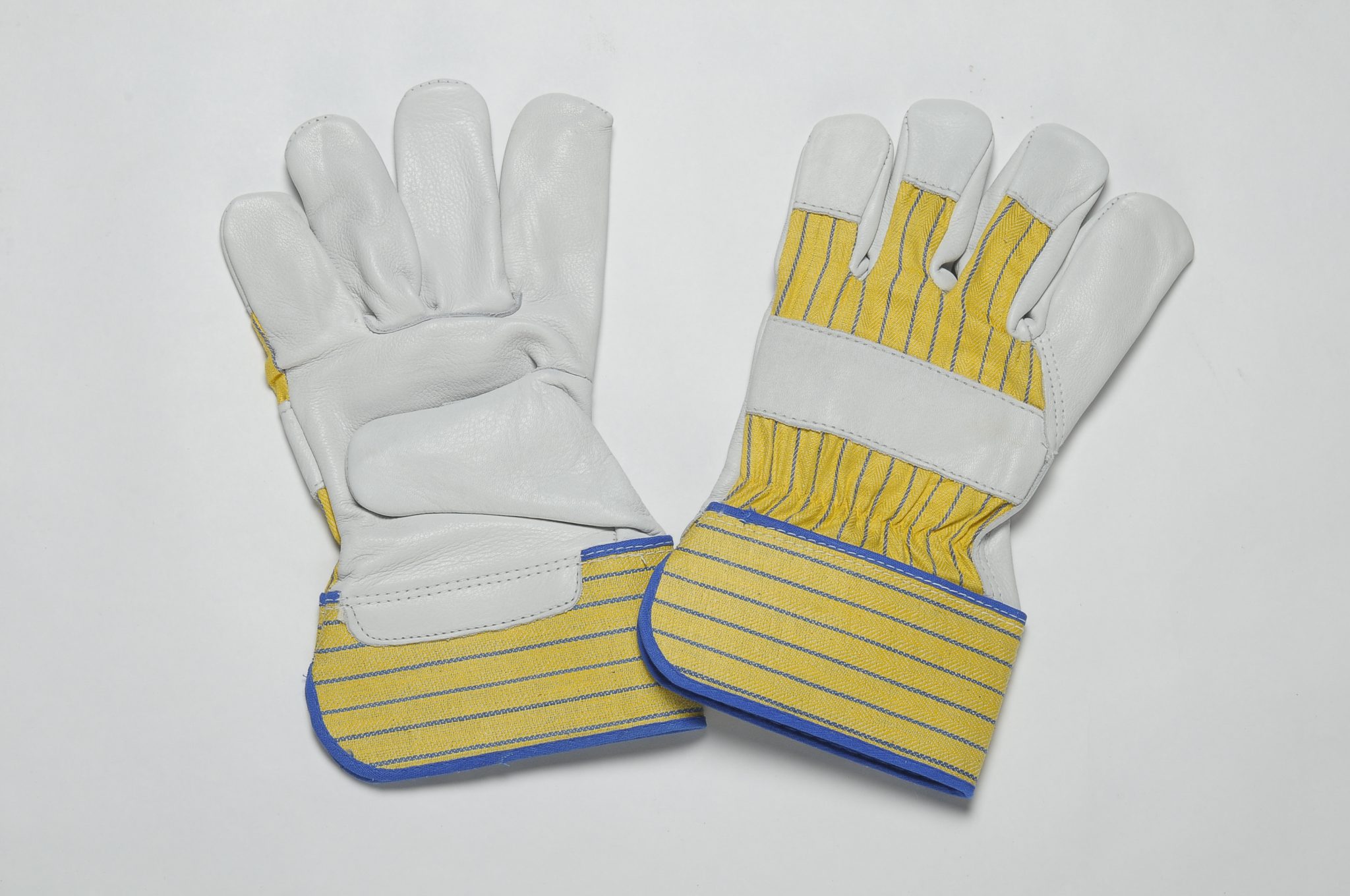 NATURAL GRAIN GLOVES, FLANNEL LINER IN PALM, YELLOW BLUE CUFF & BACK. ADJUSTIBLE ELASTIC IN THE WRIST
