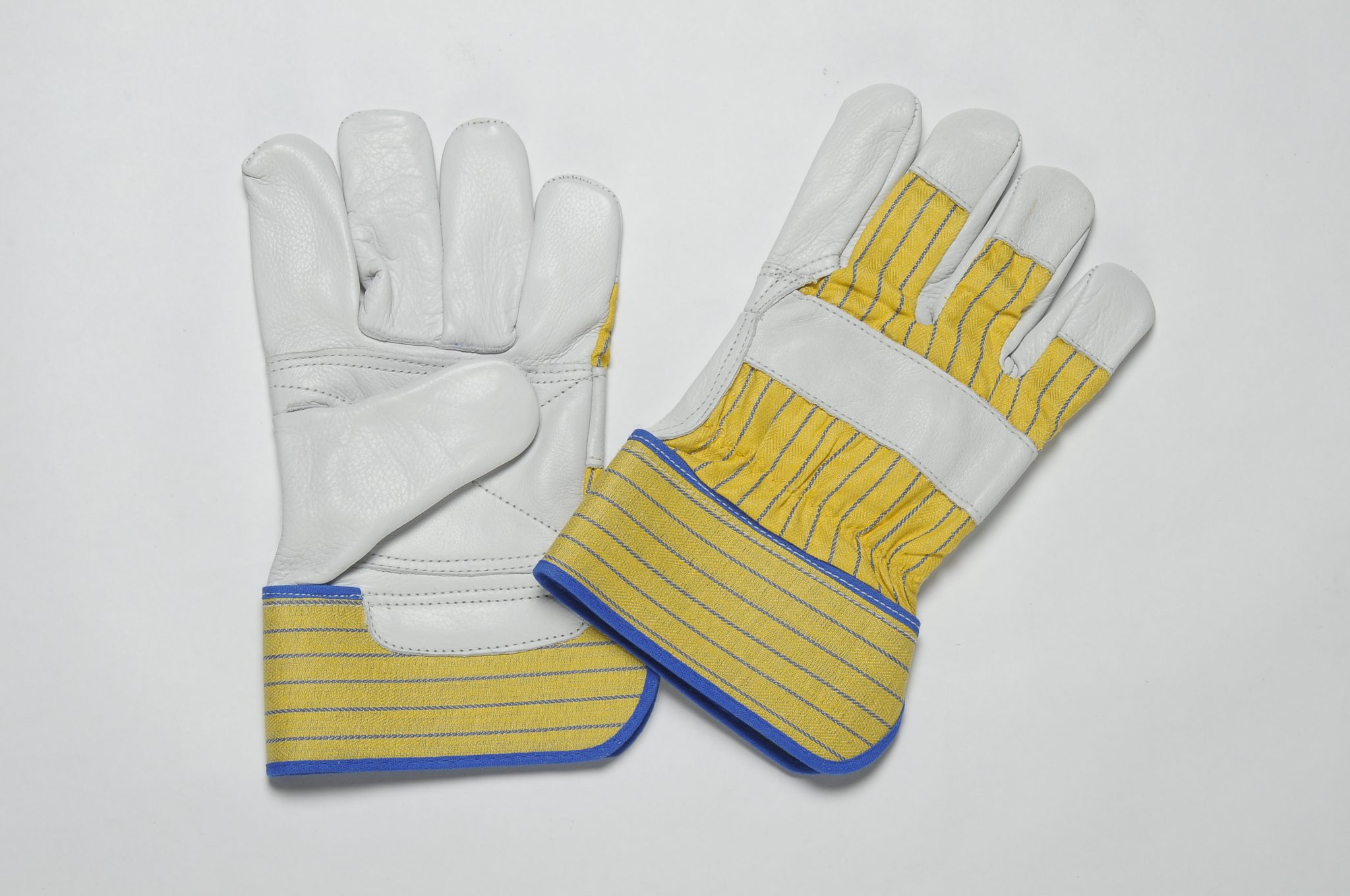NATURAL GRAIN GLOVES, FLANNEL LINER IN PALM, YELLOW BLUE CUFF & BACK. ADJUSTIBLE ELASTIC IN THE WRIST